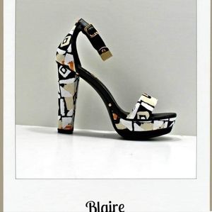 Ms. Mary Mac Blair hand designed platform sandals with gold plated ankle straps
